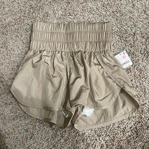 Beige free people movement shorts